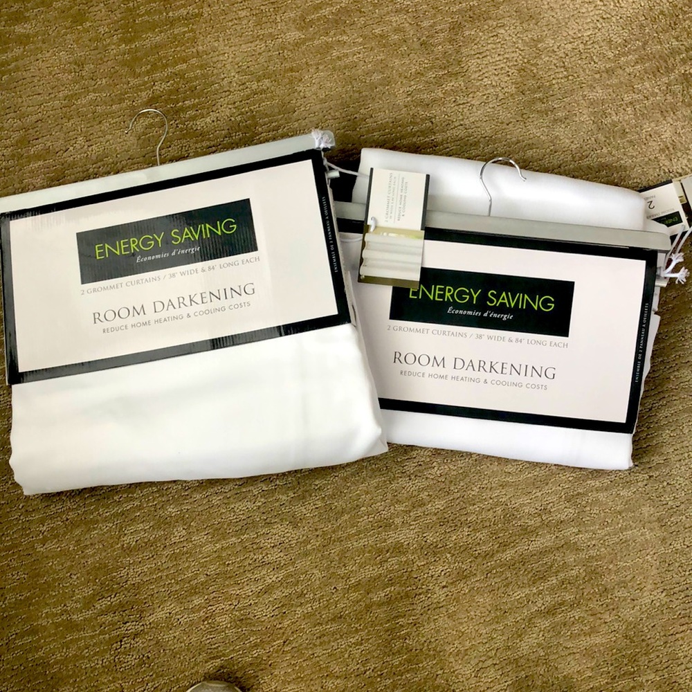 2 pair of white room darkening curtains